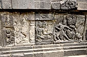 Prambanan - Ramayana reliefs of Shiva Temple. Panels of Rama threatens a bird who stole offerings. 